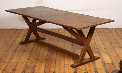 Lot 607 - A large oak live edge dining table, on rustic...
