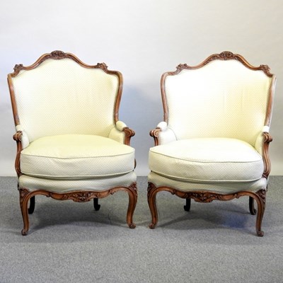 Lot 639 - A pair of late 19th century French walnut armchairs