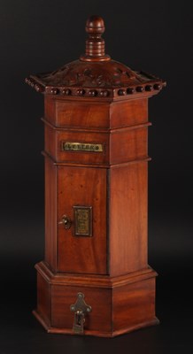 Lot 269 - A Victorian style carved wooden country house...