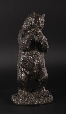 Lot 64 - A bronze model of a bear, shown standing