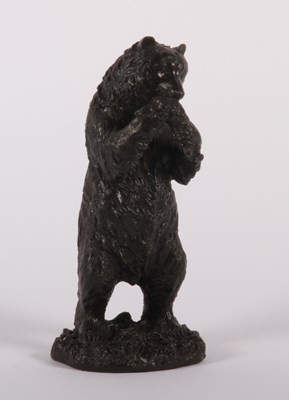 Lot 56 - A bronze model of a bear, shown standing