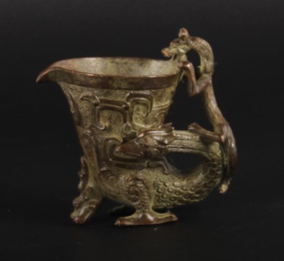 Lot 108 - A small Chinese bronze libation cup