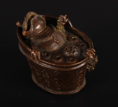 Lot 373 - A Chinese bronze box, in the form of a bathing...