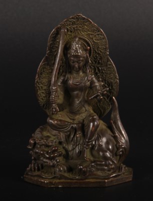 Lot 92 - A Chinese bronze figure of Guanyin