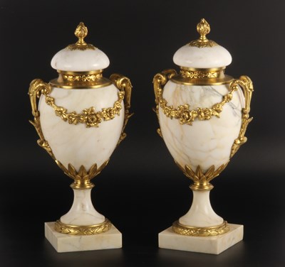 Lot 25 - A pair of white marble and gilt metal mounted...