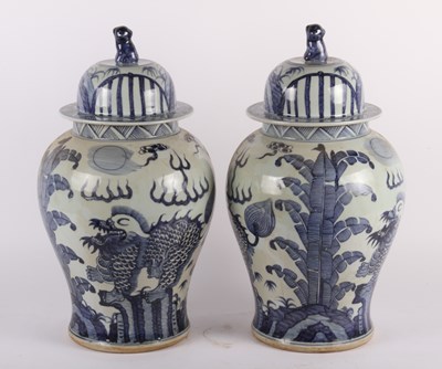 Lot 88 - A pair of Chinese blue and white temple jars...