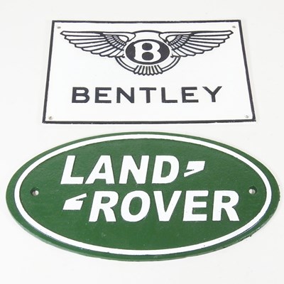 Lot 579 - A painted cast iron sign Land Rover, 35cm wide,...