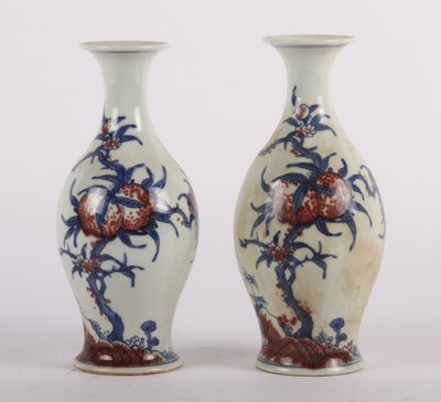 Lot 336 - A pair of Chinese blue, white and red...