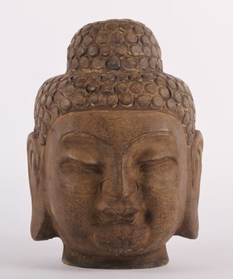Lot 765 - A Chinese carved stone Buddha head