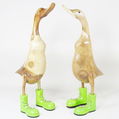 Lot 642 - Two wooden models of ducks, each wearing...