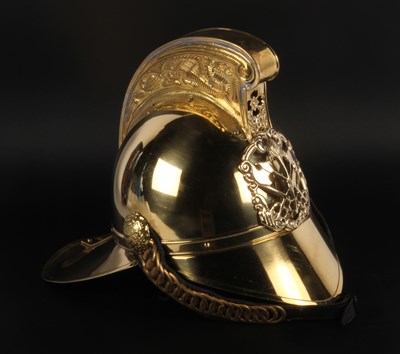 Lot 734 - A brass fireman's helmet
