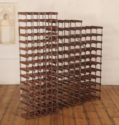 Lot 700 - A set of three wooden wall-mounted open wine...