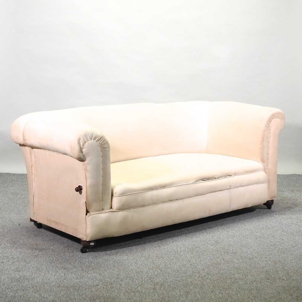 Lot 88 - An early 20th century cream upholstered chesterfield sofa