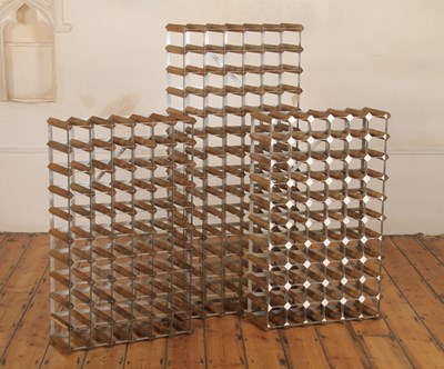Lot 738 - A set of three wooden wall-mounted open wine...