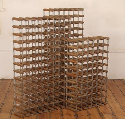 Lot 723 - A set of three wooden wall-mounted open wine...