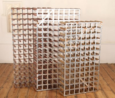 Lot 555 - Three wooden wall-mounted open wine racks