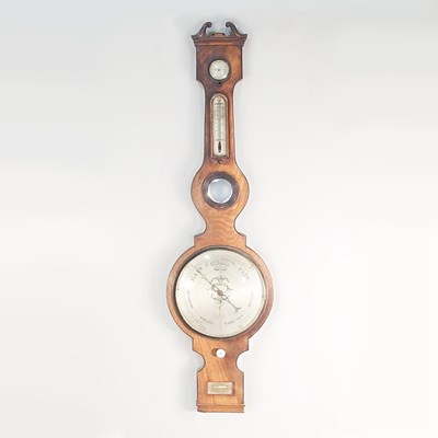 Lot 239 - A 19th century mahogany and ebony strung wheel...