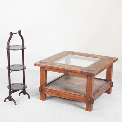 Lot 683 - A hardwood two tier coffee table, with a glass...