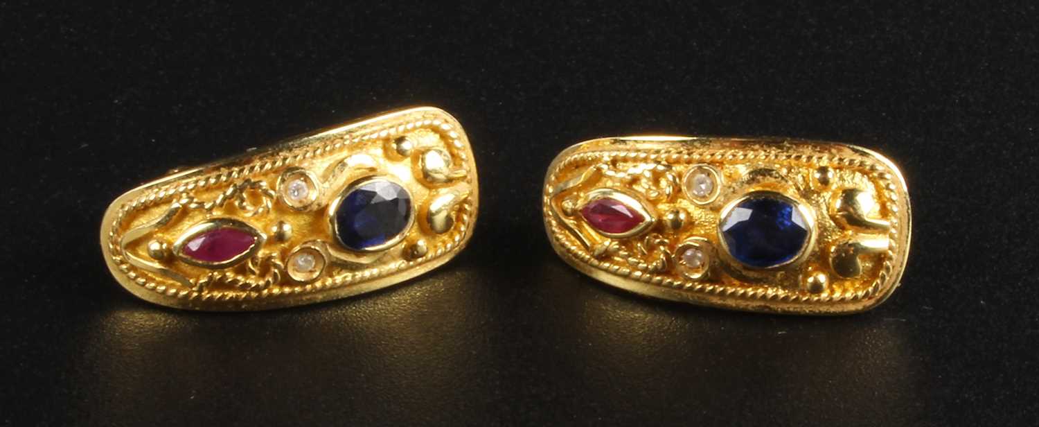 Lot 42 - A pair of 18 carat yellow gold ruby, sapphire