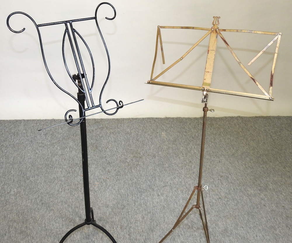 Lot 520 A black painted metal music stand