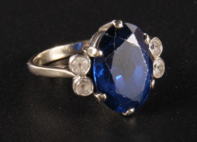Lot 410 - A sapphire and diamond ring, probably white...