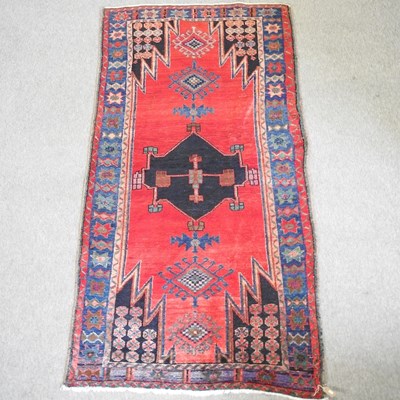 Lot 194 - A Turkish woollen rug