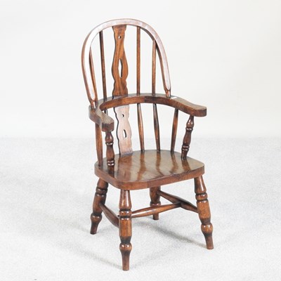 Lot 58 - A children's windsor armchair, on turned legs