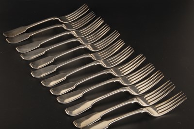 Lot 241 - A set of twelve silver fiddle pattern forks,...