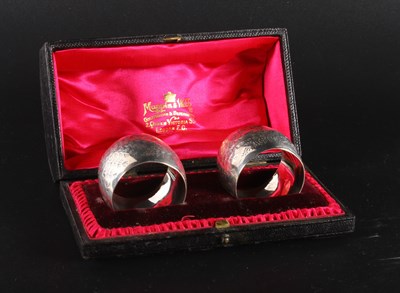 Lot 341 - A pair of Mappin and Webb silver napkin rings,...