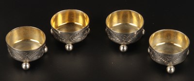 Lot 119 - A set of four Victorian silver table salts,...