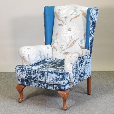 Lot 662 - A floral and velvet patchwork upholstered armchair