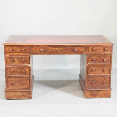 Lot 673 - A Victorian walnut pedestal desk, with an...