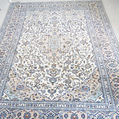 Lot 679 - A Persian kashan carpet, with a central...