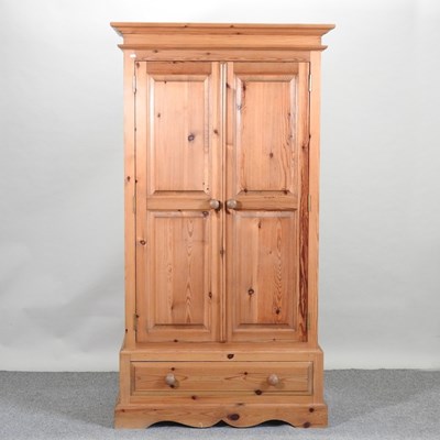 Lot 423 - A modern pine double wardrobe