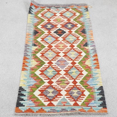 Lot 304 - A chobi kilim runner, with all over diamond...