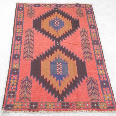 Lot 640 - A baluchi rug, with two central medallions and...