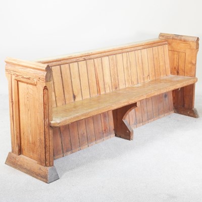 Lot 154 - An early 20th century pitch pine church pew,...