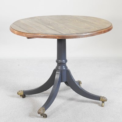 Lot 584 - A modern pedestal table, on a painted base,...