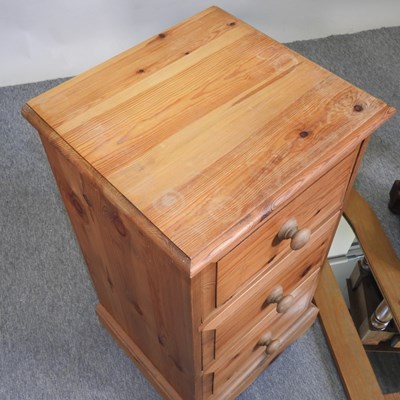 Lot 396 - A modern pine narrow chest of drawers