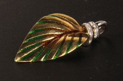 Lot 49 - An 18 carat yellow gold and green enamel...