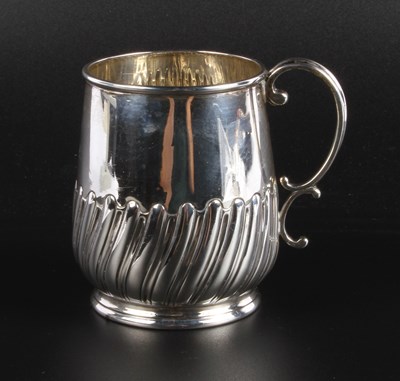 Lot 258 - A Victorian silver christening mug, of half...