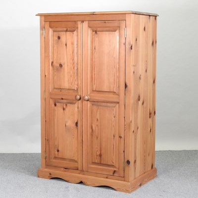 Lot 425 - A modern pine double wardrobe