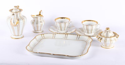 Lot 578 - A 19th century gilt and white porcelain tete-a-...