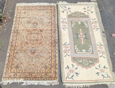 Lot 688 - A Persian rug, on a green ground, 160 x 93cm,...