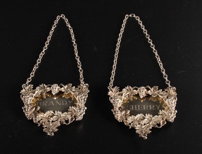 Lot 91 - A pair of Elizabeth II silver wine labels,...