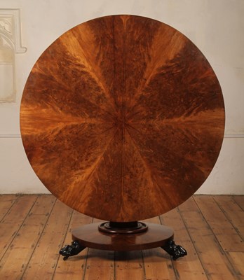 Lot 55 - A Regency radially veneered flame mahogany...