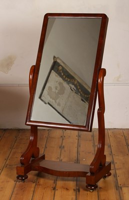 Lot 83 - A 19th century mahogany swing-framed cheval...