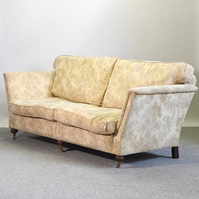 Lot 521 - A Duresta cream upholstered three seat sofa