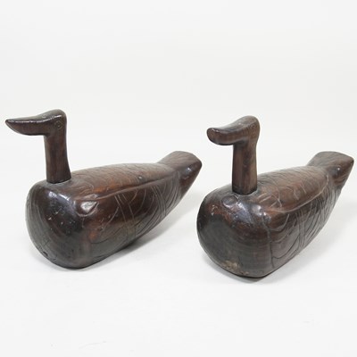 Lot 396 - A pair of Eastern carved wooden ducks, 25cm...