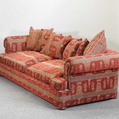 Lot 669 - A Duresta red upholstered three seat sofa